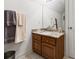 Bathroom features granite countertop on wood vanity and a large framed mirror at 1044 Martin Ln., Conway, SC 29526
