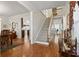 Open entryway with hardwood floors, a staircase, and a view into the kitchen at 1044 Martin Ln., Conway, SC 29526