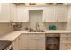 Bright kitchen with modern appliances, sleek countertops, and custom dishwasher panel at 108 Pipers Ln. # 108, Myrtle Beach, SC 29575