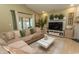 Inviting living room with comfortable seating, a TV, decor, and plenty of natural light at 108 Pipers Ln. # 108, Myrtle Beach, SC 29575