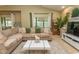 Cozy living room featuring a comfortable sectional sofa, stylish decor, and a bright, airy atmosphere at 108 Pipers Ln. # 108, Myrtle Beach, SC 29575