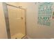 Clean shower stall with a glass door, set against a backdrop of beachy themed decorations at 108 Pipers Ln. # 108, Myrtle Beach, SC 29575