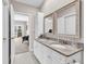 Granite counter tops and dual sinks featured in this bathroom at 110-1 Whitetail Way # 1, Pawleys Island, SC 29585