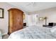 This bedroom features neutral walls, carpet flooring, and bathroom access at 110-1 Whitetail Way # 1, Pawleys Island, SC 29585