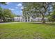 Traditional home with large front lawn and a sprawling covered porch at 110-1 Whitetail Way # 1, Pawleys Island, SC 29585