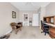 Office space featuring a built-in desk, carpet flooring, and access to bathroom at 110-1 Whitetail Way # 1, Pawleys Island, SC 29585