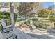 Inviting outdoor patio area, perfect for relaxing, with views of the beautifully landscaped backyard at 110-1 Whitetail Way # 1, Pawleys Island, SC 29585