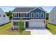 Charming two-story home featuring a well-manicured lawn and a two-car garage at 1102 Boswell Ct., Conway, SC 29526