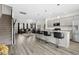 Open concept kitchen featuring an island with bar seating and stainless appliances at 1102 Boswell Ct., Conway, SC 29526