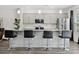 Kitchen island with bar seating and stainless steel appliances at 1102 Boswell Ct., Conway, SC 29526