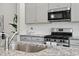 Well-equipped kitchen with granite countertops, stainless steel appliances and subway tile backsplash at 1102 Boswell Ct., Conway, SC 29526