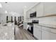 Open concept kitchen featuring stainless appliances and granite countertops at 1102 Boswell Ct., Conway, SC 29526