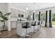 Open concept kitchen featuring an island with bar seating and stainless appliances at 1102 Boswell Ct., Conway, SC 29526
