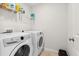 Laundry room featuring a washer, dryer, and storage shelving at 1102 Boswell Ct., Conway, SC 29526