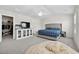 Main bedroom featuring a TV, a walk-in closet, and bright windows at 1102 Boswell Ct., Conway, SC 29526