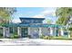 The fitness center exterior features a welcoming entrance, lush greenery, and a well-maintained landscape at 1221 Tidewater Dr. # 122, North Myrtle Beach, SC 29582
