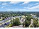 Aerial view of homes near the ocean featuring residential streets, trees, and visible community amenities at 1352 Jolly Roger Dr., North Myrtle Beach, SC 29582