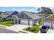 Aerial view of a beautiful single Gathering home, with a two-car garage and manicured landscaping at 1352 Jolly Roger Dr., North Myrtle Beach, SC 29582