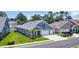Aerial view of a well-maintained single Gathering home with a two car garage, landscaped yard and inviting porch at 1352 Jolly Roger Dr., North Myrtle Beach, SC 29582