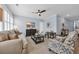 Comfortable living room with a ceiling fan, plantation shutters and stylish furnishings at 1352 Jolly Roger Dr., North Myrtle Beach, SC 29582