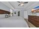 Tranquil main bedroom with a comfortable bed, wooden dresser, and an en-suite bathroom at 1352 Jolly Roger Dr., North Myrtle Beach, SC 29582