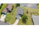 This aerial view captures the backyard with the lake with a fountain, and neighborhood at 1407 Sunningdale Ln., Myrtle Beach, SC 29588