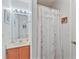 Cozy full bathroom with decorative shower curtain, vanity with mirror and lighting at 1407 Sunningdale Ln., Myrtle Beach, SC 29588