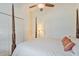 Cozy bedroom featuring a four-poster bed and a ceiling fan, perfect for relaxation and comfort at 1407 Sunningdale Ln., Myrtle Beach, SC 29588