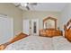Bedroom with a bed and view of the wood dresser with mirror at 1407 Sunningdale Ln., Myrtle Beach, SC 29588