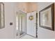 Bright entryway with decorative wreath, leading into the main house at 1407 Sunningdale Ln., Myrtle Beach, SC 29588