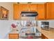 Close-up of the kitchen with granite counters and stainless steel appliances at 1407 Sunningdale Ln., Myrtle Beach, SC 29588