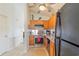 View of the kitchen, featuring oak cabinets, stainless appliances, and ceiling fan at 1407 Sunningdale Ln., Myrtle Beach, SC 29588