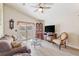 Inviting living room with a plush sofa, glass coffee table, and entertainment center at 1407 Sunningdale Ln., Myrtle Beach, SC 29588