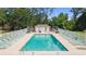 Community pool with plenty of lounge chairs and sun umbrellas for residents to enjoy at 1407 Sunningdale Ln., Myrtle Beach, SC 29588