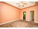 Spacious bedroom features ensuite bathroom, closet and ceiling fan at 1412 Reid Ct., Myrtle Beach, SC 29588