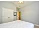 Bedroom with ceiling fan, closet and doorway to adjacent space at 1412 Reid Ct., Myrtle Beach, SC 29588