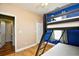 Cozy bedroom with bunk beds, closet and neutral walls, perfect for children or guests at 1412 Reid Ct., Myrtle Beach, SC 29588