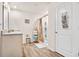 A clean and functional bathroom with a shower, toilet, and vanity with lots of light at 142 Pine Forest Dr., Conway, SC 29526