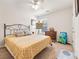A bedroom featuring carpeted floors, a ceiling fan, and a window with natural light at 142 Pine Forest Dr., Conway, SC 29526