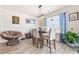 Cozy dining room with modern lighting and stylish decor, perfect for Gathering meals at 142 Pine Forest Dr., Conway, SC 29526