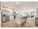 Open kitchen featuring stainless appliances, breakfast bar, and easy flow to the dining area at 142 Pine Forest Dr., Conway, SC 29526