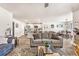 A spacious living room connects to a kitchen and dining area creating an inviting, open-concept living space at 142 Pine Forest Dr., Conway, SC 29526