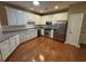 Modern kitchen featuring stainless steel appliances and bright lighting at 1428 Saint Thomas Circle # B-1, Myrtle Beach, SC 29577