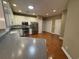 Well-lit kitchen with stainless steel appliances and ample cabinet space at 1428 Saint Thomas Circle # B-1, Myrtle Beach, SC 29577