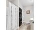 Full bathroom featuring a shower, a stackable washer and dryer, and tile floors at 149 Ella Kinley Circle # 302, Myrtle Beach, SC 29588