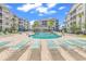 Community pool with multiple lounge chairs and beautifully maintained landscaping at 149 Ella Kinley Circle # 302, Myrtle Beach, SC 29588
