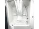 Bathtub with white shower curtain and handheld shower head at 161 Seawatch Dr. # 710, Myrtle Beach, SC 29572