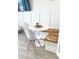 Bright dining nook with stylish white chairs and a white table at 161 Seawatch Dr. # 710, Myrtle Beach, SC 29572