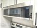 Stainless steel Whirlpool microwave above the stove at 161 Seawatch Dr. # 710, Myrtle Beach, SC 29572