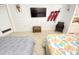 Bedroom featuring two beds, TV, surfboards, and access to a kitchen at 1805 Windmere W S Ocean Blvd. # 1109, Myrtle Beach, SC 29575